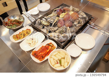 Korean Seafood Food. Steamed oysters and scallops Korean Seafood Food. Steamed oysters and scallops 130549794
