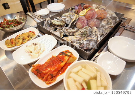 Korean Seafood Food. Steamed oysters and scallops Korean Seafood Food. Steamed oysters and scallops 130549795