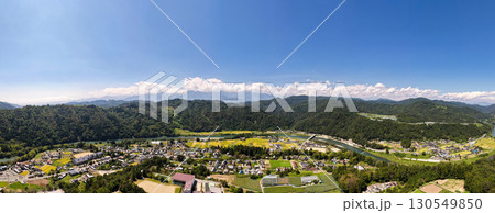 生坂小学校上空から見る生坂のパノラマ　長野県生坂村（ドローンによる空撮） 130549850