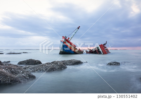 Old wrecked fishing boat on coast of Ang Sila Village, Chonburi Province of thailand. Old wrecked fishing boat on coast of Ang Sila Village, Chonburi Province of thailand. 130551402