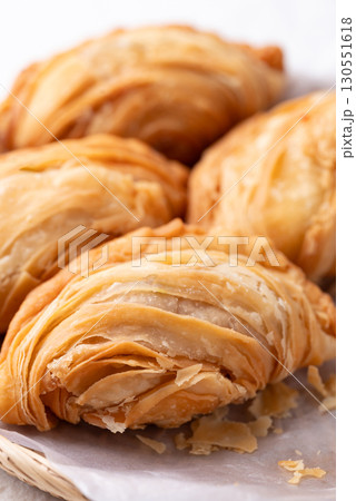 Curry puff stuffed with chicken or sweet potatoes, Thai snack food style 130551618