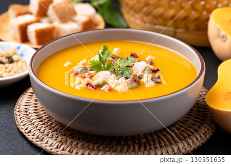 Butternut squash pumpkin soup in a bowl, Homemade food in autumn season 130551635