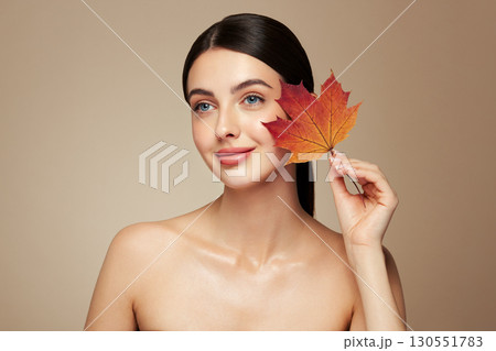 Autumn portrait of beautiful woman with clean fresh skin Autumn portrait of beautiful woman with clean fresh skin 130551783