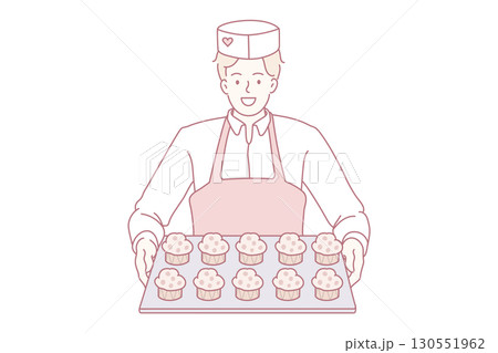 Pastry baking worker with cupcakes tray. 130551962