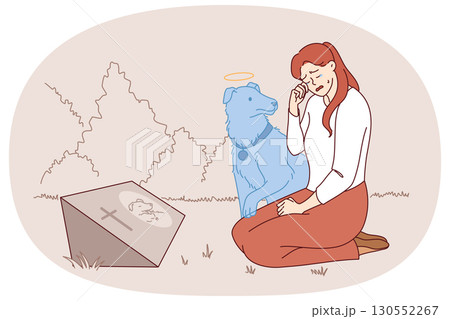 Woman cries over death of beloved dog, sits near gravestone and feels presence of pet soul 130552267