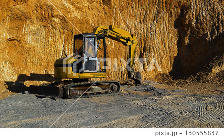 Excavator working at quarry Excavator working at quarry 130555837