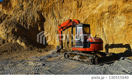 Red bulldozer at quarry site Red bulldozer at quarry site 130555840