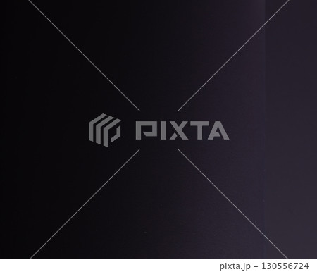 Premium navy blue designer paper texture. Minimalistic, chic backdrop with deep shadows and matte Premium navy blue designer paper texture. Minimalistic, chic backdrop with deep shadows and matte 130556724