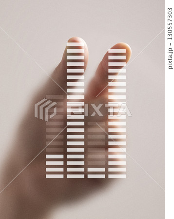 Creative composition. Hand with fingers behind futuristic equalizer bars in digital interface visualization 130557303