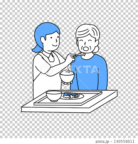 A caregiver assisting elderly people with meals 130558011