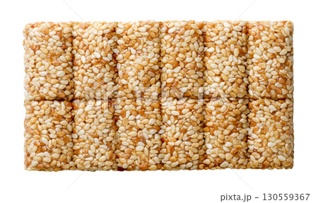 Kozinaki slab with sesame cut out on a white. Top view 130559367
