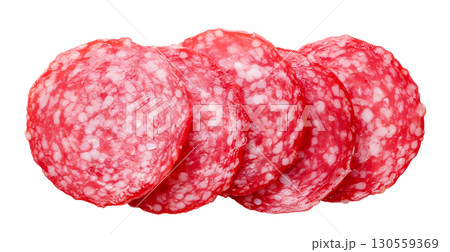 Sausage slices cut on a white background. Top view Sausage slices cut on a white background. Top view 130559369