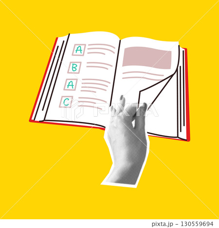 Hand turning page of book with ABC format 130559694