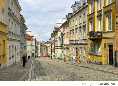 Warsaw Poland May 20 2025 Charming cobblestone street in Old Town with historic buildings, colorful 130560156