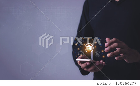 Young man with smartphone mobile hand touching to visualize money growth Young man with smartphone mobile hand touching to visualize money growth 130560277