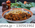 Delicious hungarian goulash with spaetzle on a decorated plate 130563902