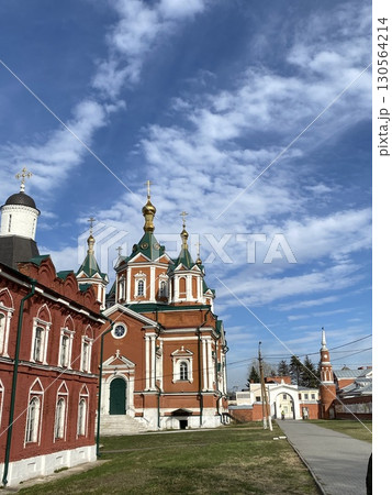 Orthodox church under blue sky with partly cloudy weather and vibrant architectural details 130564214
