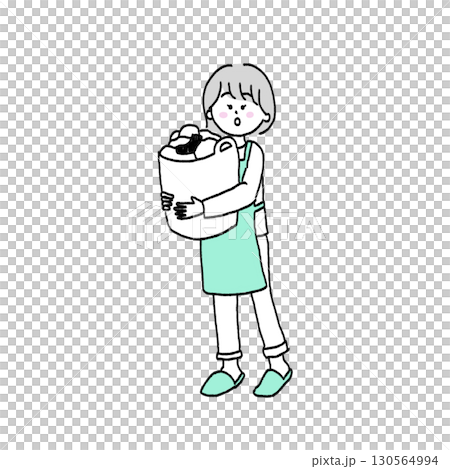 A woman hanging out the laundry 130564994