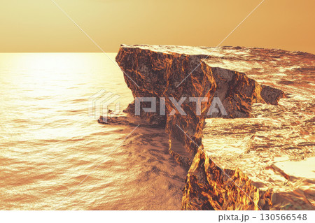rocky cliff overlooking ocean golden hour, showcasing warm tones of orange and beige, with crystal clear water reflecting 130566548