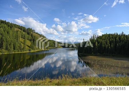 Fantastic landscape of Lake Uchkel in Altai, Russia Fantastic landscape of Lake Uchkel in Altai, Russia 130566585