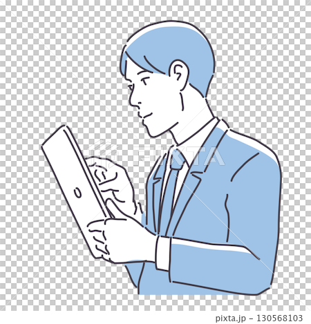 A man in a suit looking at a tablet 130568103