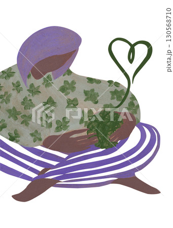 Acrylic painting with your own hands. A woman in a sweater and striped leggings holds a ball of thread in her hands 130568710