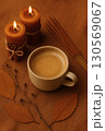 Autumn scents concept with cinnamon candles and coffee 130569067