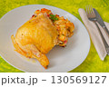 Roasted chicken leg with stuffing Czech food 130569127