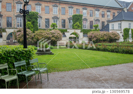 The Royal library Garden in Copenhagen, Denmark. Famous park in city center in spring during the rain. Bad rainy weather in danish capital. 130569578