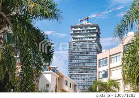 Construction of modern skyscraper building in Limassol, Cyprus Construction of modern skyscraper building in Limassol, Cyprus 130571283