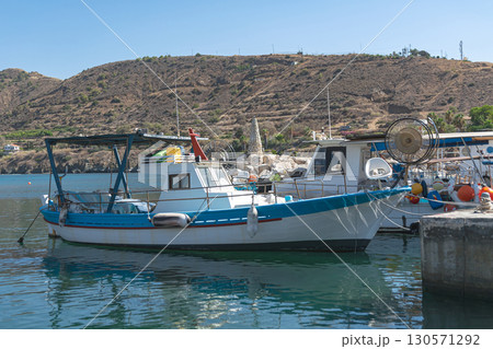 Traditional fishing boats moored in Pomos Harbour, Paphos District, Cyprus 130571292