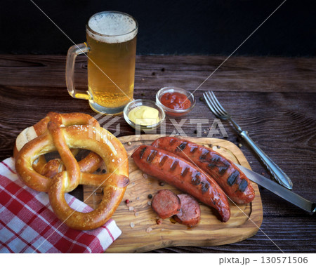 Bavarian sausages with pretzels and beer Bavarian sausages with pretzels and beer 130571506