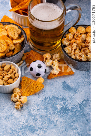 Beer and different snacks for Superbowl or football party Beer and different snacks for Superbowl or football party 130571765