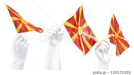 Hand holding flag of North Macedonia. Isolated 3d Rendering Hand holding flag of North Macedonia. Isolated 3d Rendering 130572858
