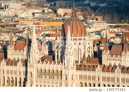 The sun is shining on the beautiful hungarian parliament building in budapest 130573161