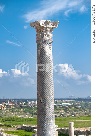 Fluted column with corinthian capital in the Kourion archaeological site, overlooking the landscape of episkopi, Cyprus 130573178