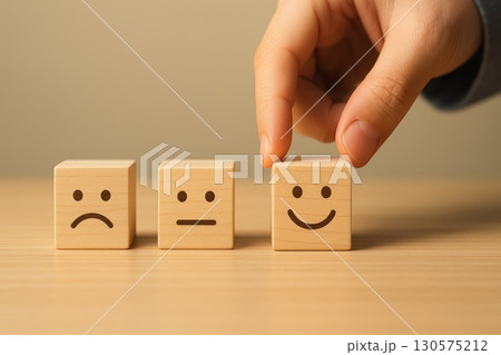 Customer Feedback Selection Emotions Displayed through Wooden Cubes Soft Light Tabletop Human Touch Concept 130575212