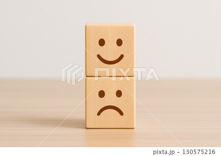 Emotional Resilience Overcoming Negativity with Stacked Wooden Blocks Minimalist Tabletop Scene Mental Health Awareness 130575216
