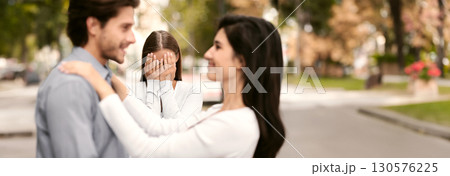New love. Woman crying, watching her ex boyfriend starts happy love relations, park background 130576225