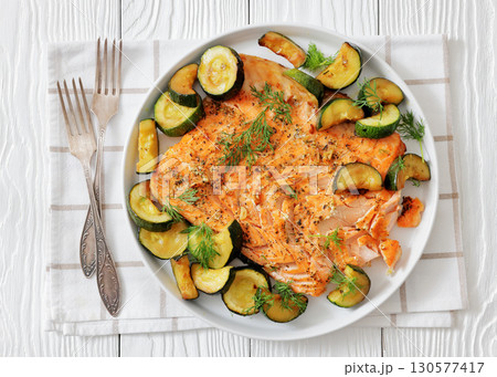freshly baked salmon fillet with zucchini and dill 130577417
