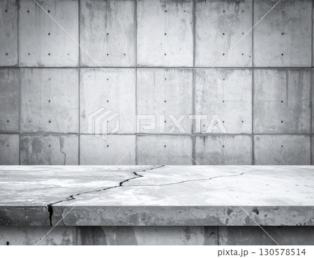 Gray Concrete Platform Against Weathered Wall 130578514