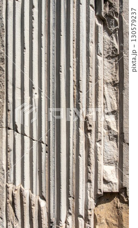 Close-up of Weathered Stone Column with Vertical Stripes Close-up of Weathered Stone Column with Vertical Stripes 130579237