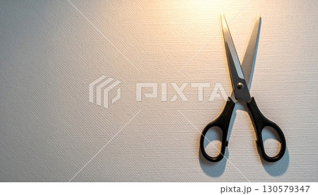 Black Metal Scissors on Grey Textured Background Black Metal Scissors on Grey Textured Background 130579347