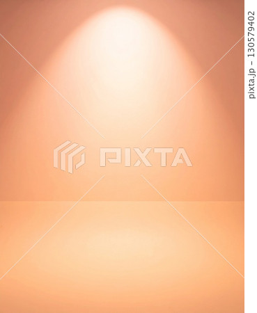 Soft Orange Studio Background with Gentle Spotlight 130579402