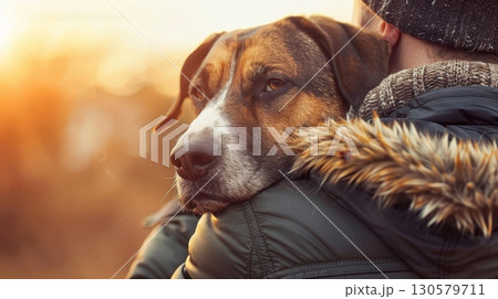 Adorable Scruffy Puppy Receives Tender Care from Kind Volunteer at Local Animal Adoption Center 130579711