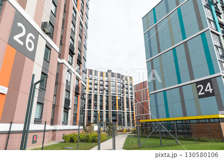 Modern high-rise apartment buildings in a residential area with clear views of property insurance Modern high-rise apartment buildings in a residential area with clear views of property insurance 130580106