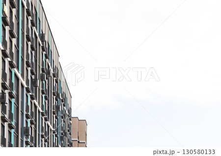 High-rise apartment buildings in a residential area illustrating urban living and property High-rise apartment buildings in a residential area illustrating urban living and property 130580133