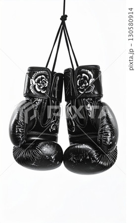 Pair of Black Leather Boxing Gloves Hanging Pair of Black Leather Boxing Gloves Hanging 130580914