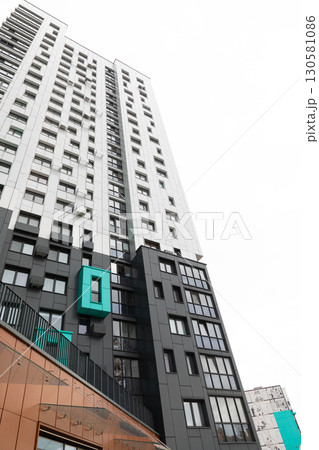 High-rise apartment buildings in a modern residential area showcasing architectural design and urban 130581086