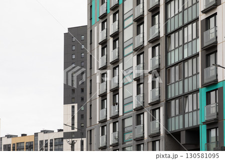 Modern high-rise apartment buildings in a residential area highlighting urban living options 130581095